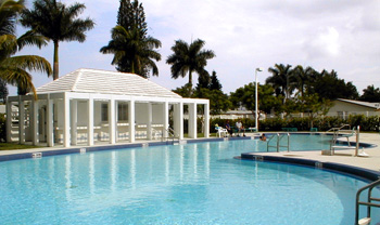 Village Beach Club featuring poolside gazebo