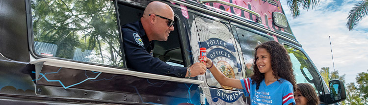 Police Giving Ice Cream To Children