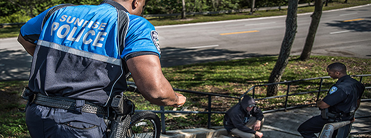 Bike Officer with Suspect Image