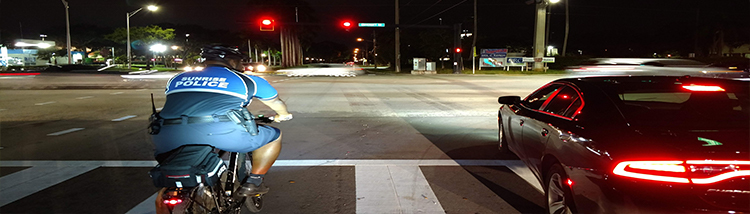 Bike patrol at traffic light