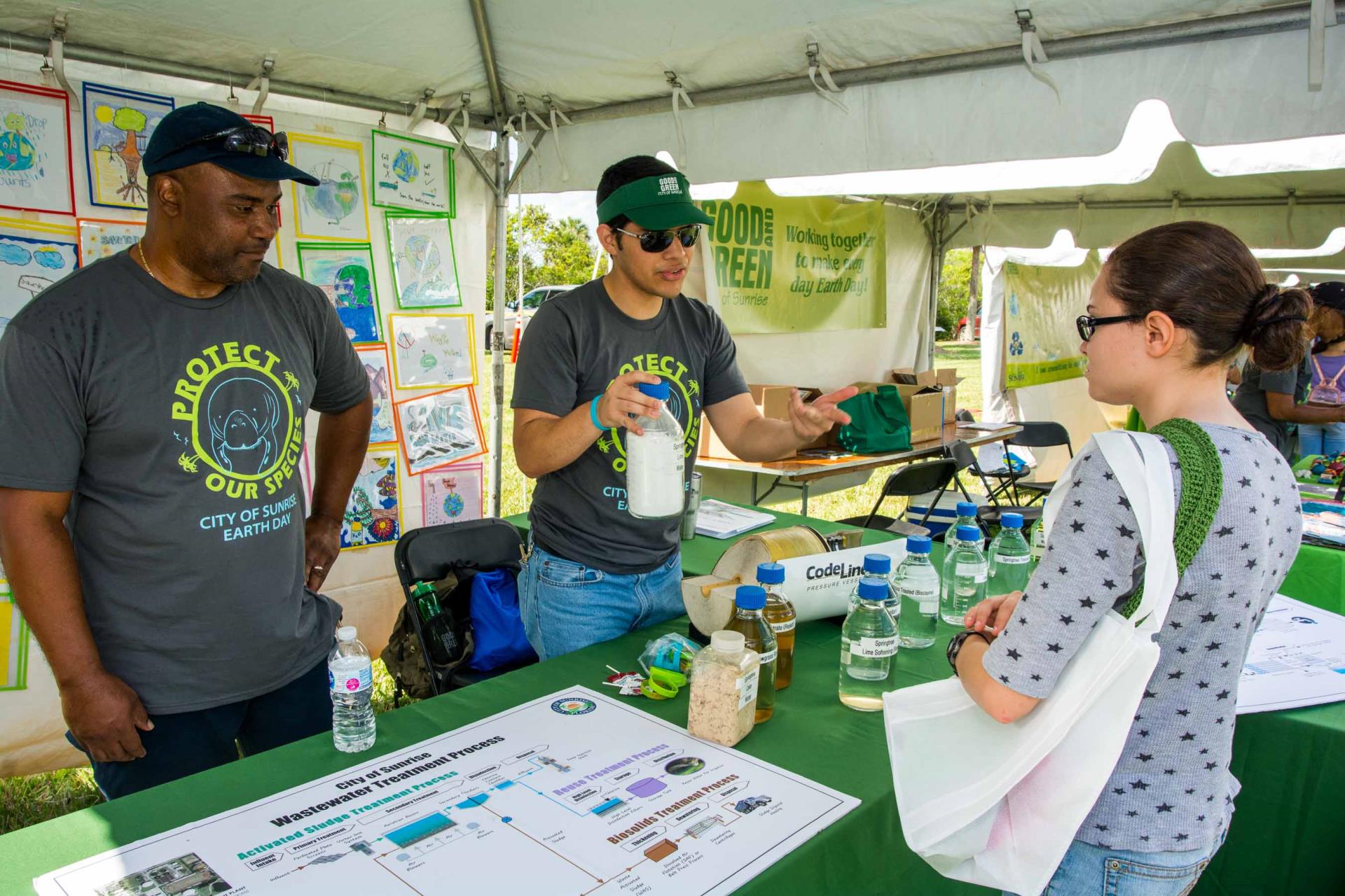 City Staff in the Sunrise Utilities Booth at the 2019 Earth Day Festival