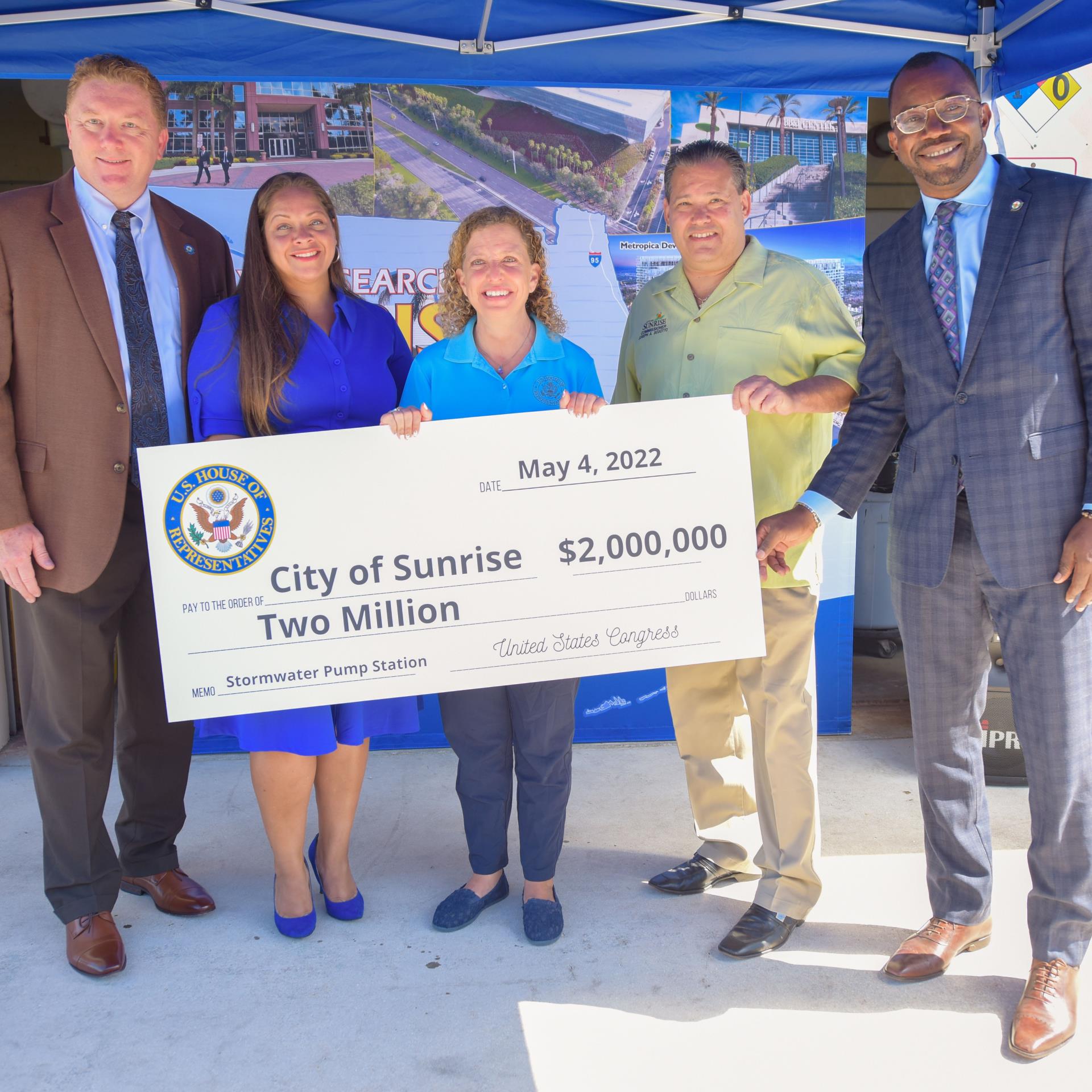 City of Sunrise Commissioners accept a $2 million check from Congresswoman Debbie Wasserman Schultz for a Stormwater Pump Station