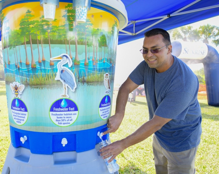 Filling up at the Sunrise Utilities Quality on Tap Hydration Station