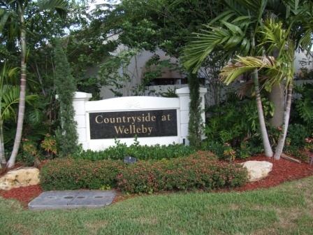 Lanscape around Countryside at Welleby neighborhood sign