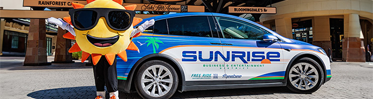 Sunrise Freebee Tesla at Sawgrass Mills with Sunny the Sunrise Mascot